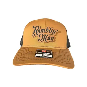 Ramblin Man - Are you a Ramblin man? If so, grab this custom Richardson hat with a brown leather patch. We all have a little ramblin in us but if you're one thats known for it this is the perfect hat for you. A special tribute piece to The Allman Brothers