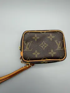 Pre-owned Louis Vuitton Coated Canvas Small Leather Goods Wapiti Pouch Monogram Canvas with Wrist Strap and Gold Hardware