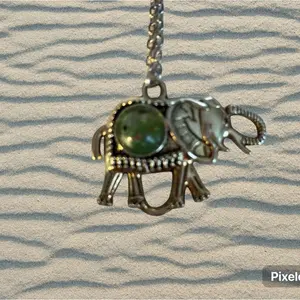 Exquisite Jade Elephant-Shaped Necklace with Green Stone and Silver Chain