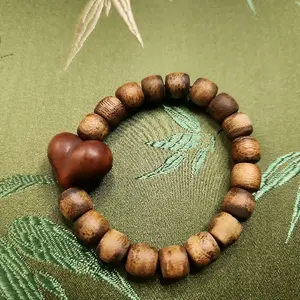 agarwood and nanhong agate heart shaped bracelet