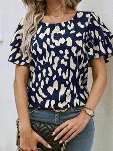 A women's short-sleeved chiffon Fitted blouse with a dark blue base, a white round neck, and a double-layered lot leaf hem, suitable for summer, suitable for daily commuting and home wear.