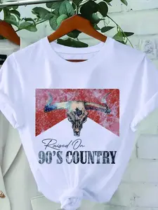 "Raised On 90's Country" Bull Skull Graphic T-Shirt, Vintage Western Glitter Print Crew Neck Tee, Unisex Short Sleeve Country Music Cotton Top, Trendy Retro Aesthetic Shirt for Cowboy Fans, 90s Nostalgia Lovers and Streetwear Enthusiasts
