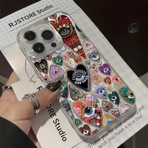Heart-shaped 2D Feather and Rhinestone Eye Pattern TPU Shock-Resistant Phone Case (1-Pack) compatible with iPhone 17 16 15 14 13 12 11 ProMax Pro Plus and Air waterproof drop-proof scratch-resistant