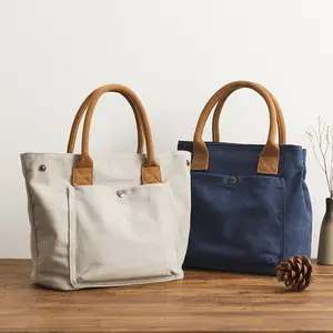 Canvas Tote Bag - Fashionable Durable Versatile with Front Pocket Button Closure for Everyday Use Stylish Design and Convenient Features