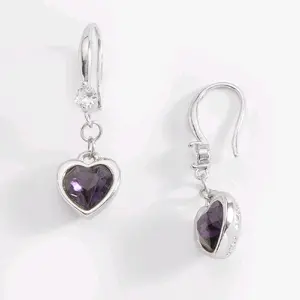 Heart-shaped platinum earrings with amethyst crystal