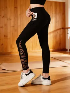 A set of women's high-waisted, high-elastic mesh patchwork tight sports pants, fashionable fitness yoga pants and dance pants