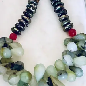Handcrafted gemstone necklace featuring Peruvian opal, peacock freshwater coin pearls, and cherry quartz statement necklace