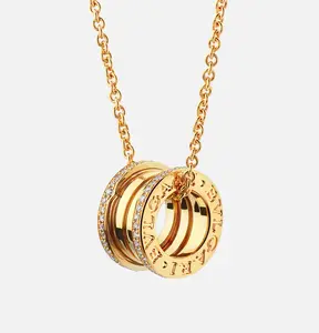 Pre-owned Bvlgari B.zero1 necklace with 18 kt yellow gold chain and 18 kt yellow gold round pendant set with pavé dia on the edges