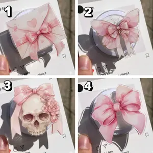 Cute pink bow phone grips a perfect Christmas gift to add charm and style to your holiday phone setup.