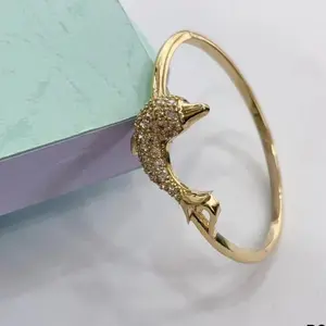 Dolphin Bangle available in 57mm and 60mm Gold plated