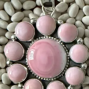 Pink conch cluster pendant