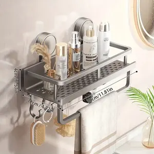 1-Pack Strong Rust-Resistant Suction Cup Bathroom Storage Rack — Space-Saving Wall-Mounted Floating Shelf with Towel Hook, holds shampoo, soap bars, and various bathroom items; sturdy metal construction, suitable for modern bathroom spaces