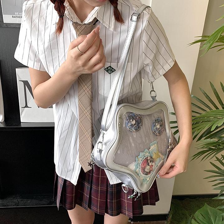 RIVERICH 3-Way Convertible Star-Shaped Ita Bag for Anime & K-Pop Fans, Multi-Strap Acrylic Display Backpack with Removable Shoulder Straps. This unique pentagram bag features a clear window to showcase your pins, charms, and collectibles