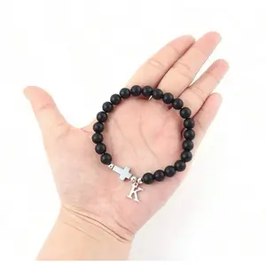 Pulsera para Mano Te with Initial - Black Bead Bracelet featuring a Cross Charm for Men