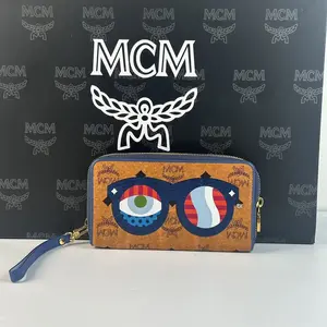 Pre-owned MCM Visetos Coated Canvas Optical Eyes Print Zip Around Long Wallet with Wrist Strap