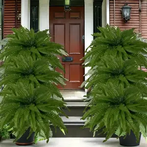 Realistic tropical Artificial Boston Fern with bright green leaves, made of sturdy plastic, perfect for indoor and outdoor decoration, as well as Christmas, Thanksgiving, and Mother's Day