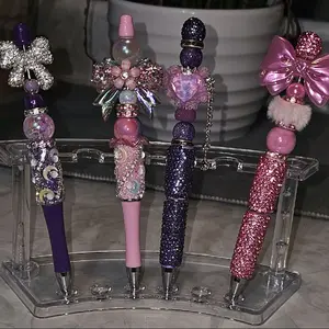 Sparkling Gemstone Pens with Bow Accents - Purple, Pink Glittery Design for Stylish Writing.  Each pen listed, is $10.00 each one.