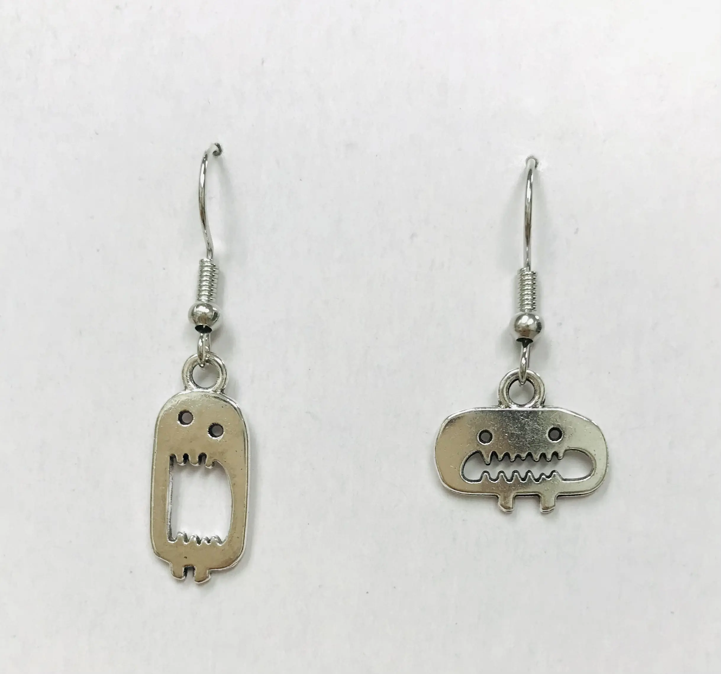 Silver Tall Monster Earrings