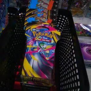 Pokemon Mega Evolution Booster Sleeved Pack with Central Figure and Circular Motif for Collectors