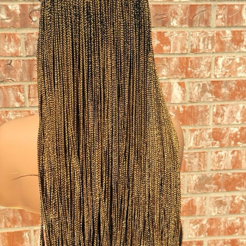 Micro Knotles braids made with fiber lace. Made with a 360 full lace in color 27 available in 30 inches