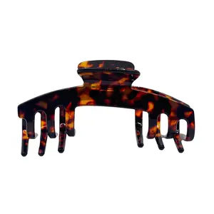 The Cynthia Brown Tortoise Hair Clip Featuring Warm, Mottled Tones for a Classic and Versatile Style Designed for Adjustable Hats Claw Grip