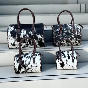 Black & white cowhide speedy bag