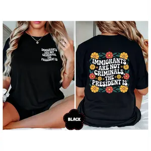 IMMIGRANTS ARE NOT CRIMINALS BUT THE PRESIDENT IS Bold Statement Floral Graphic Tee, 100% cotton Sarcastic Quotes Anti-Racism Shirt for Men Women, Anti-President Shirt