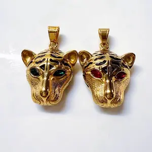 Maite Jewelry                                                Gold-Toned Tiger Head Pendants with Green and Red Eyes for Stylish Accessories