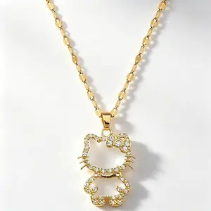 SANRIO Hello Kitty Gold Openwork Necklace – Hollow-Out Pendant with Iconic Hello Kitty Bow Design, Elegant Gold Chain for Women Teens and Sanrio Collectors