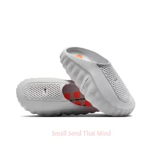 Light Grey Futuristic Mule Slides, Orange Cushioning Sphere Outsole, Perforated Upper, Sports Recovery Tech Slides
