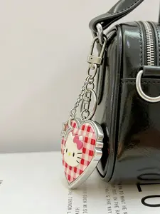 Cute leopard print checkered KT cat heart mirror keychain, suitable for daily wear, vacation dates, and other occasions, and also a delightful little gift.