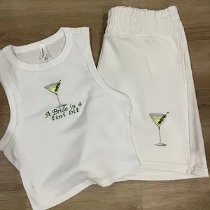 A bride in a tini bit dirty martini shorts set