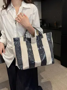 Daily commuting shopping bag，work tote bag，travel weekender bag，tote bags for gift giving，Women's Fashionable and Striped Pattern Tote Bag, Large Capacity Transparent Tote Bag, Waterproof PVC Material Handle Bag，