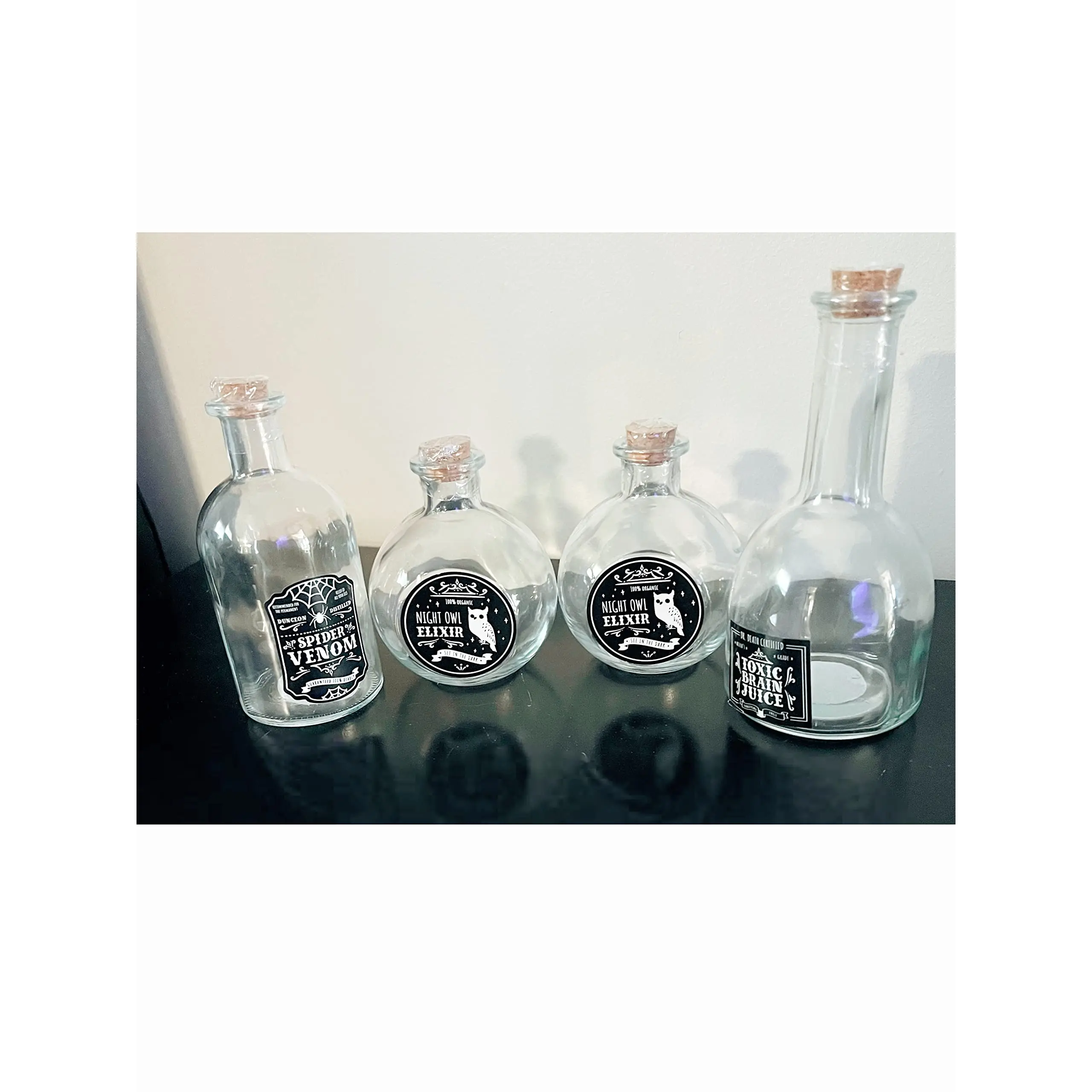 4 Pack Halloween Magic Potion Bottles Toxic Brain Juice/Spider Venom/Night Owl Elixir Set Includes 1 Toxic Brain Juice 1 Spider Venom 2 Night Owl Elixir Perfect for Halloween Parties & Spooky Decor!