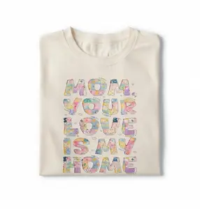 Mom, Your Love Is My Home' patchwork tee. A perfect gift for Mother's Day, featuring colorful letters and a heartfelt message. Comfort Colors fabric for a cozy fit, ideal for moms
