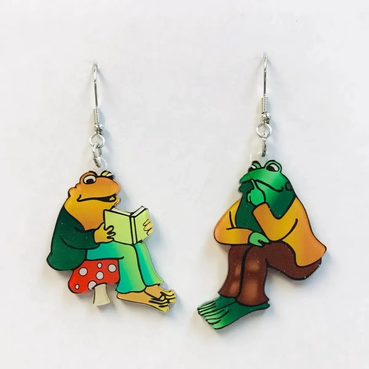 Frog Story Chatting and reading earrings Frog Story Chatting and reading earrings