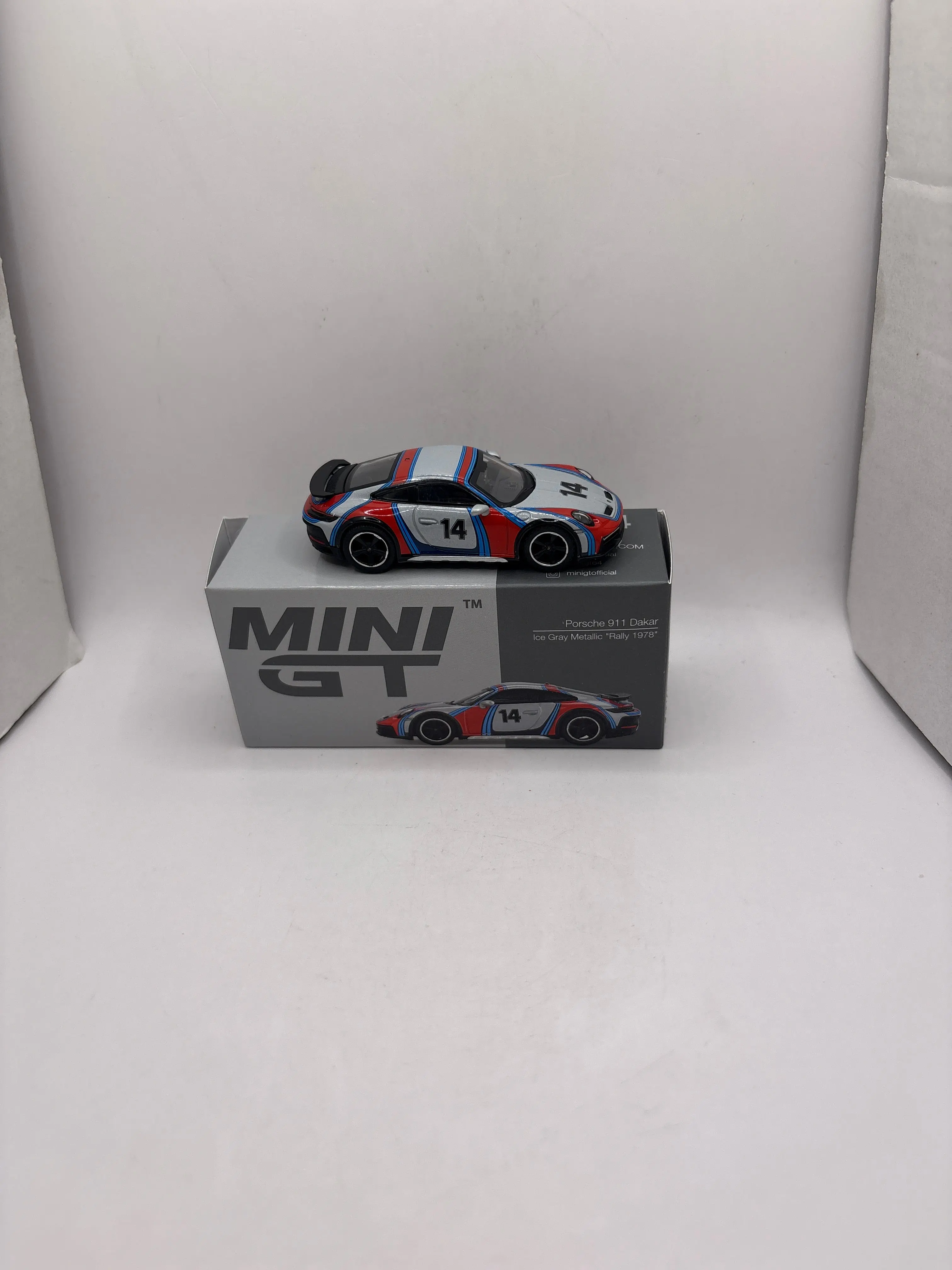 Mini GT Porsche 911 Dakar Diecast multi color