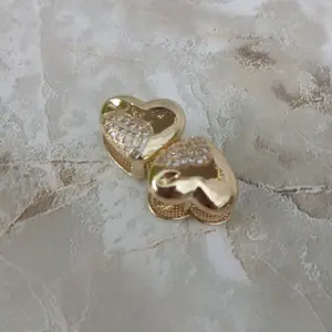 Yudy&Sussy 14k Gold Filled Heart Stud Earrings with Sparkling Stones - Elegant Jewelry for Special Occasions - Snack