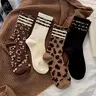 4 Pairs Women's Stylish Mid-Calf Socks - Trendy Striped Leopard Print, Comfortable, Soft For Both Lounge and Outdoor Wear
