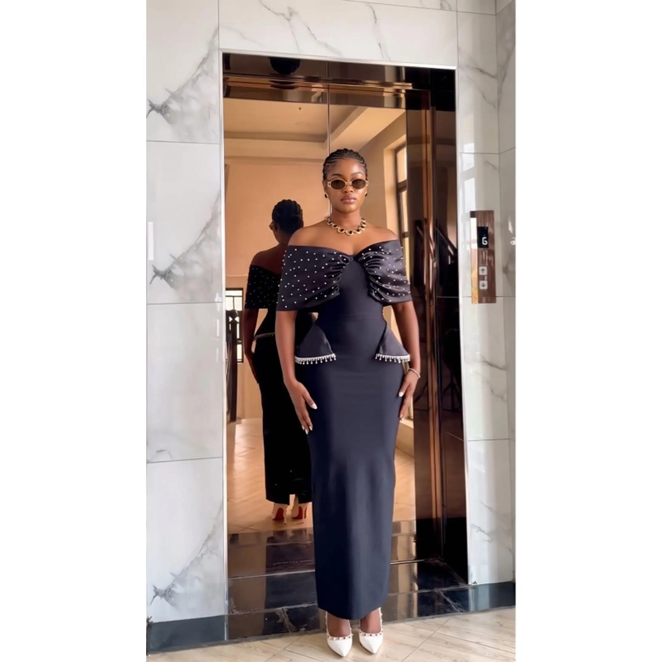 Elegant Off-Shoulder Design with Polka Dot Sleeves. Fit for Special Occasions