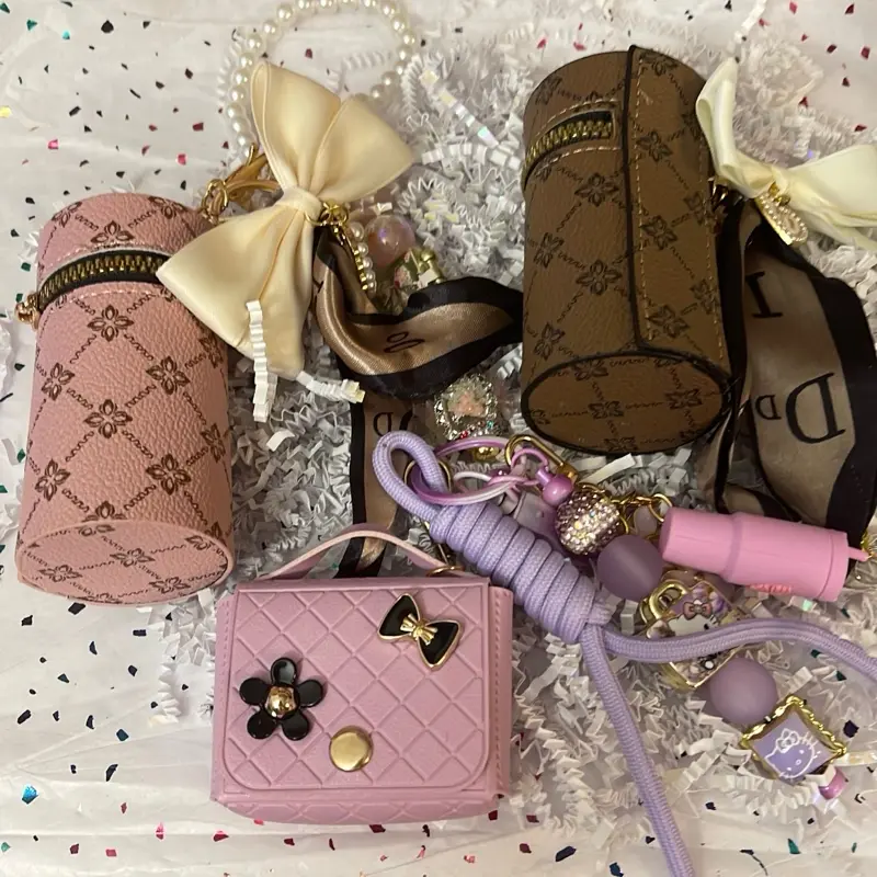 Live orders. Purse/lipstick keychains.