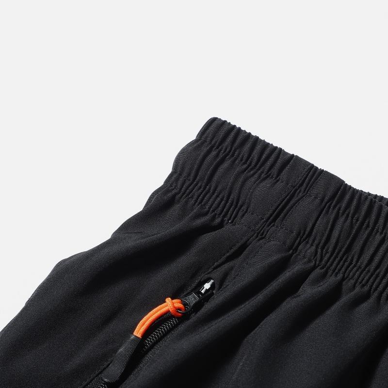 Men’s quick-dry casual athletic shorts featuring an elastic drawstring waist and zippered pockets on both sides, suitable for summer wear—ideal for outdoor sports, fitness, jogging, cycling, and basketball.
