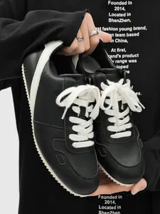 Unisex Minimalist Commute Casual Shoes: Matte Black Upper, Off-White Contrast Trim, Easy Lacing. For Office Trips