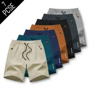 Men’s 7-pack sports-casual shorts for fitness—solid color, breathable quick-dry style with zippered pockets and a drawstring waist; suitable for outdoor activities and training; reflective strip design for fitness apparel.