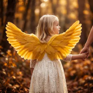 Golden feather wings as a back accessory for children and adults, suitable for birthday parties, performances, photo shoots, and creating an atmospheric ambiance, ideal for Children's Day performances and runway shows