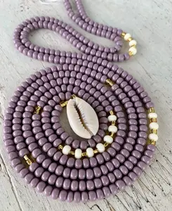 Mauve + Cowrie shell 55-inch tie-on waist bead.