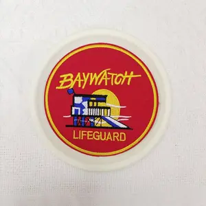 1PCS round Baywatch embroidered patch with beach rescue tower design, suitable for DIY decorative patches on hats, bags, shoes, and clothing, with back hot melt adhesive for sewing and ironing
