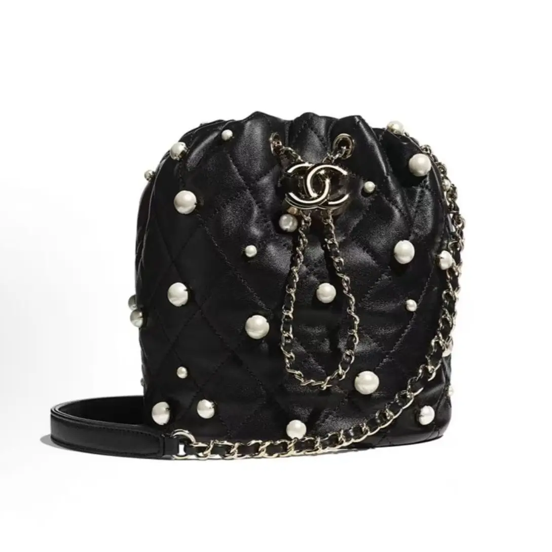 Pre-owned CHANEL Drawstring Bucket Bag — Gold Hardware, Leather Interwoven Chain, Quilted — Crossbody/Shoulder Bag — Small Size — Women's — Black