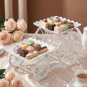 Double Layer White Lace Dessert Stand with Cart Design, Perfect for Serving Afternoon Tea Indoors and Displaying Desserts at Weddings and Parties.