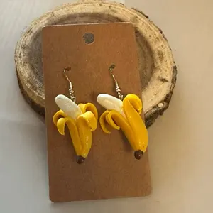 Funky Banana Earrings Polymer Clay Unique Design Yellow and White Color Scheme Fun and Quirky Style